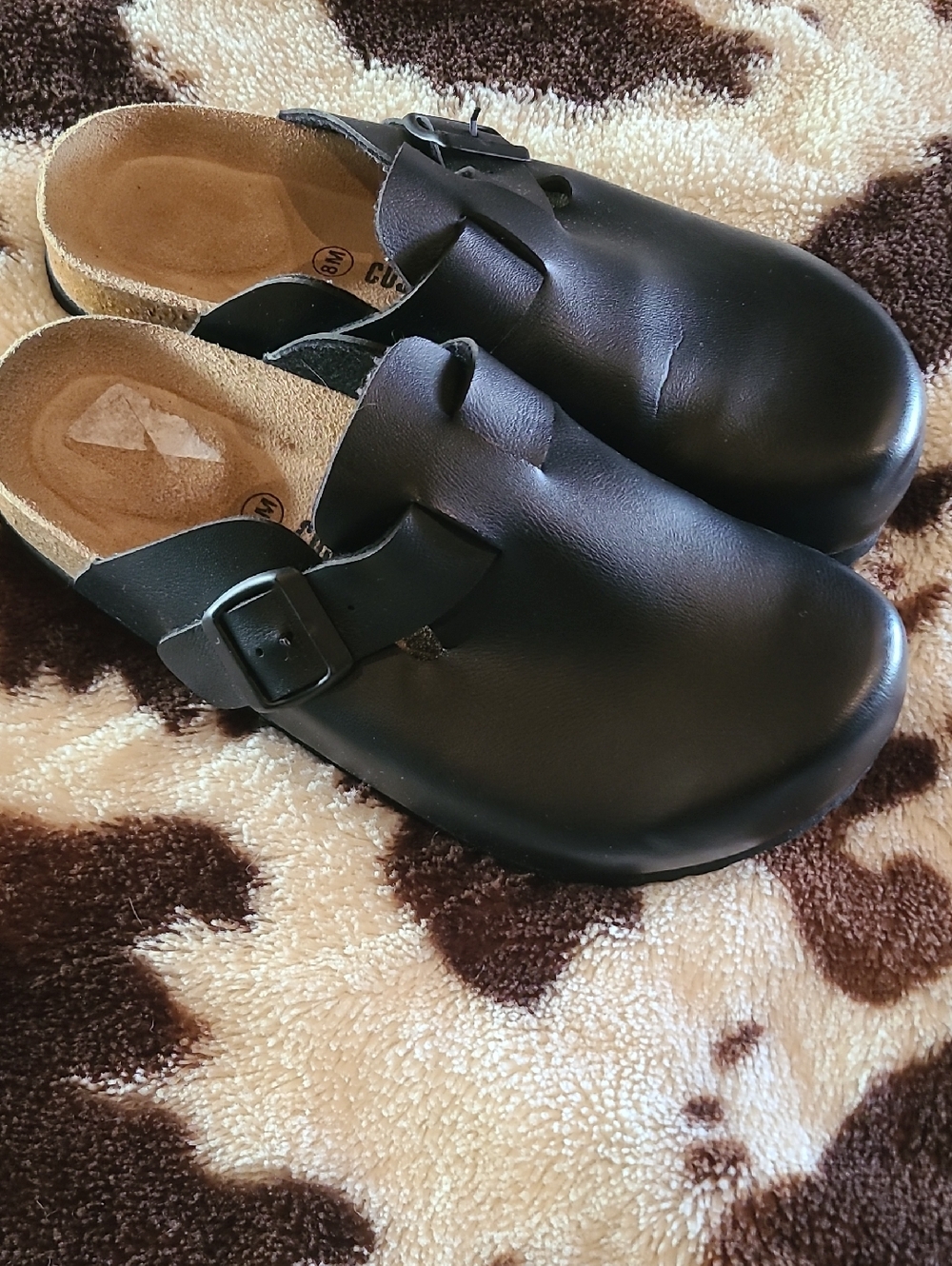 Classic Black Leather Slip-On Mules with Adjustable Buckle